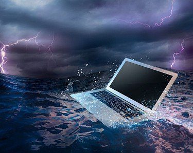 laptop on water/ damaged computer